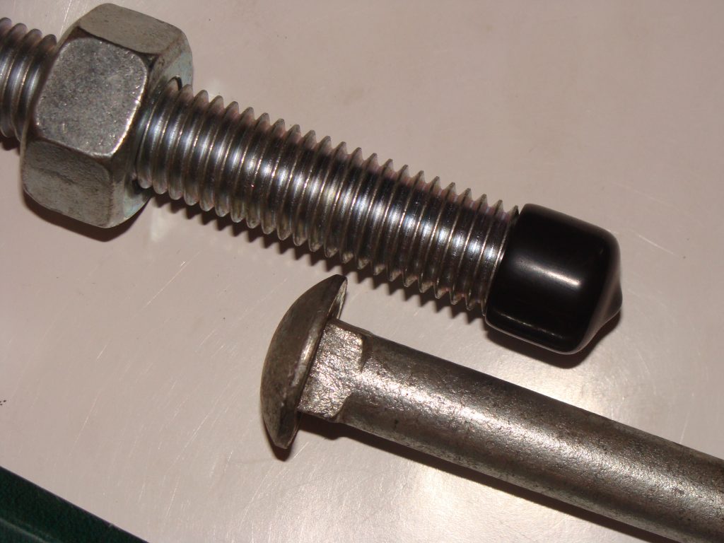 Carriage bolt with nut and plastic end cap assembled - Haiyanbolt.com